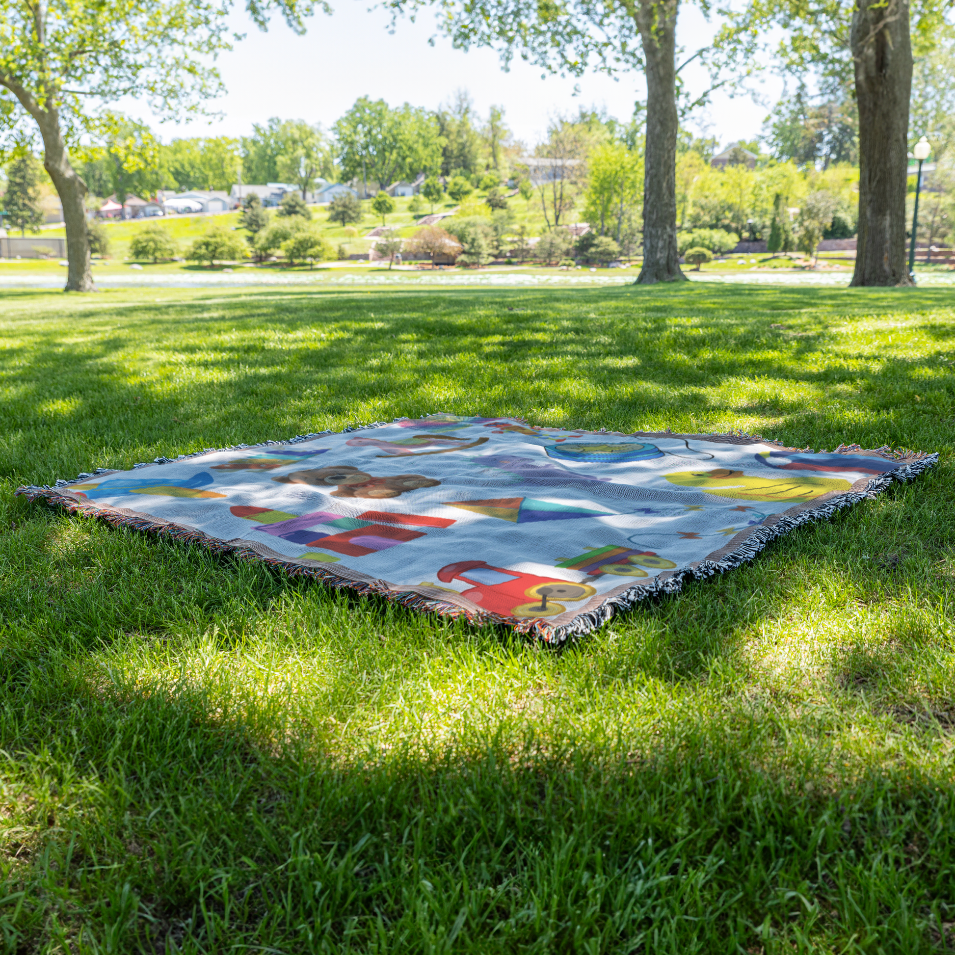 Kids woven blanket, on grass view