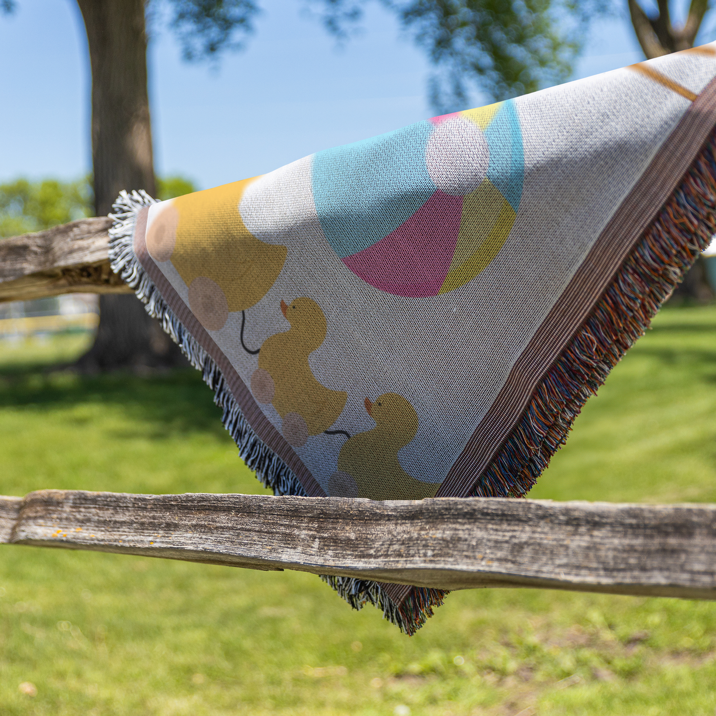 Kids toys girl woven throw blanket, outside close up view