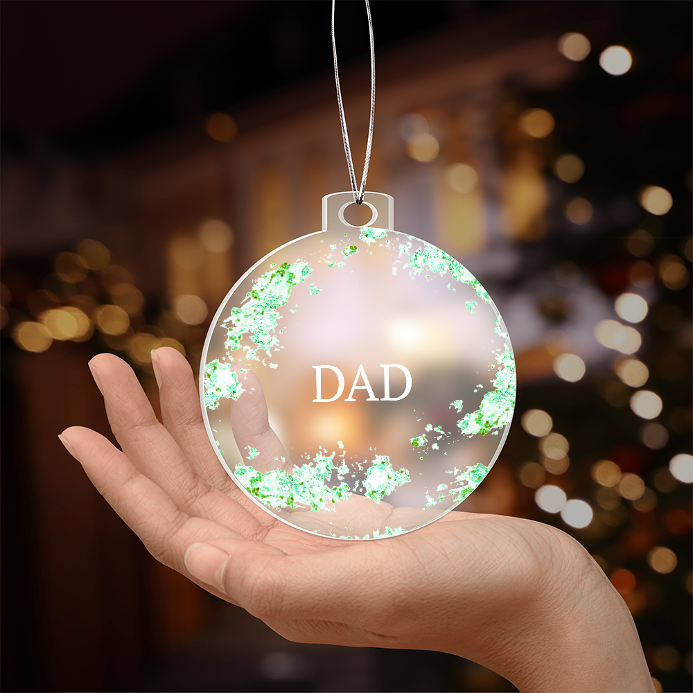 Dad Chrsitmas ornament, green, held in hand