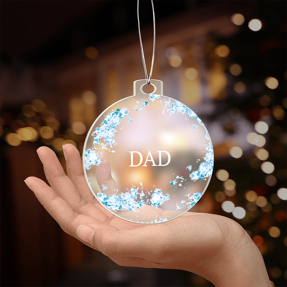 Dad christmas ornament, blue, held in hand