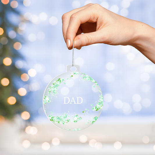 Dad Christmas Ornament, green, front view held up by hand