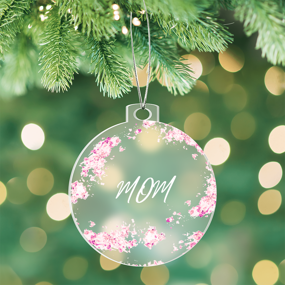 Mom Christmas ornament, pink, hanging from christmas tree